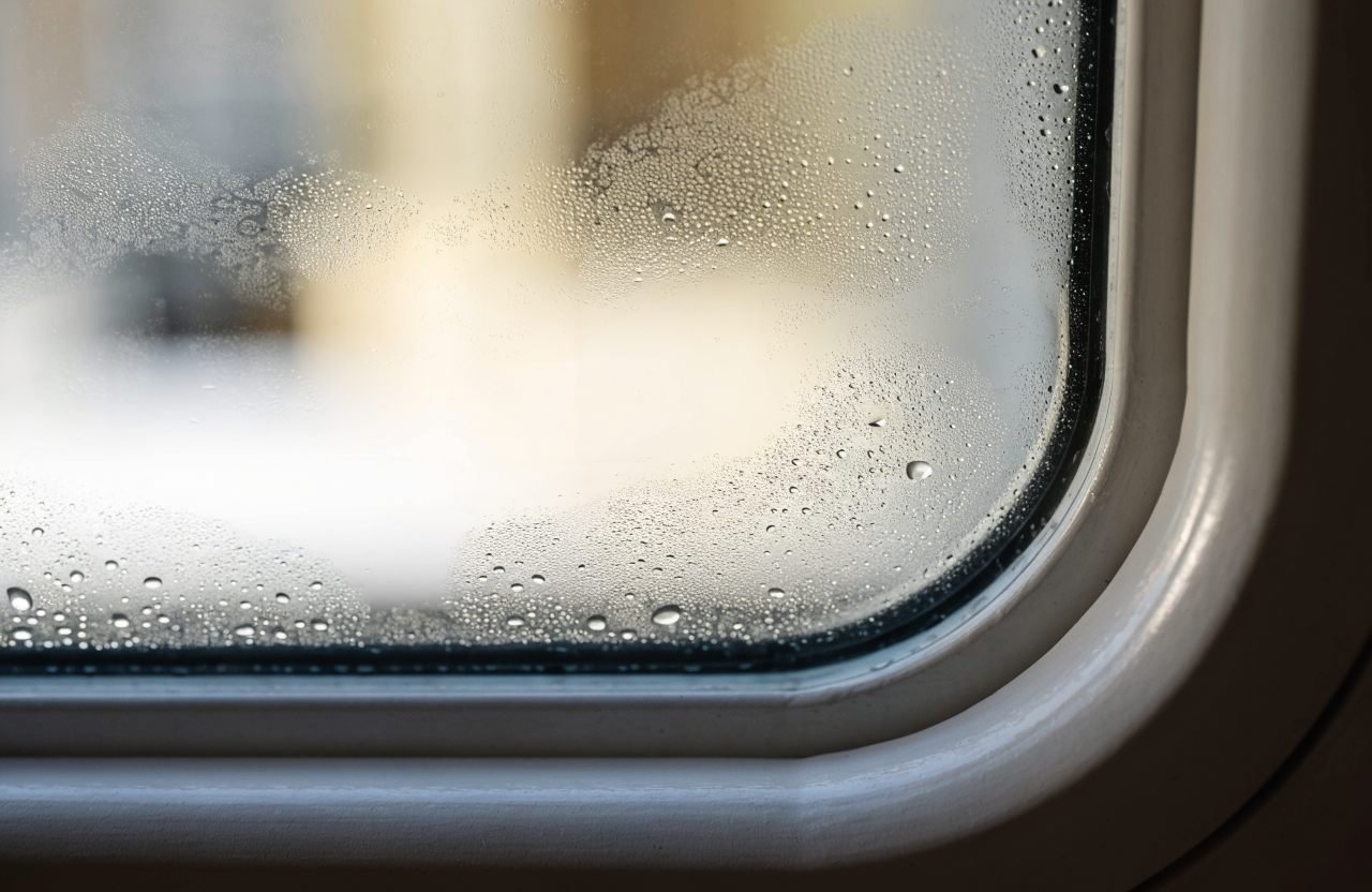 Misted double glazed unit with condensation trapped between the panes
